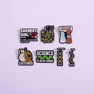 Set of seven creative science enamel pins with chemistry and biology themed designs