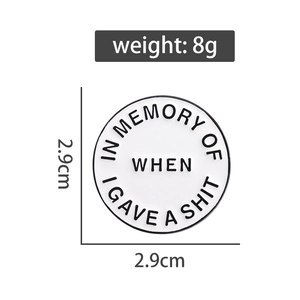 Macro view of 2.9cm circular enamel pin with humorous English text on a white background