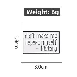Detail view of rectangular enamel pin with quote and 3.0cm x 1.8cm size dimensions