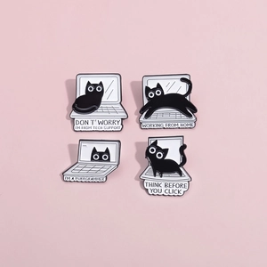 Set of four cute black cat enamel pins on pink background for laptop lovers