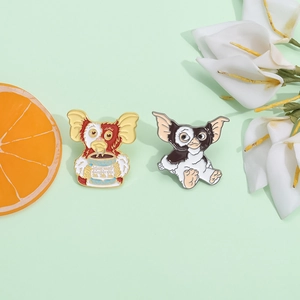 Gremlins-inspired cartoon enamel pins set featuring Gizmo and Mogwai characters