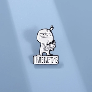 Minimalist enamel pin featuring a cartoon figure and I HATE EVERYONE slogan