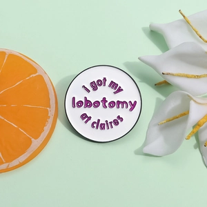 Funny white round metal enamel brooch with purple i got my lobotomy at claires text