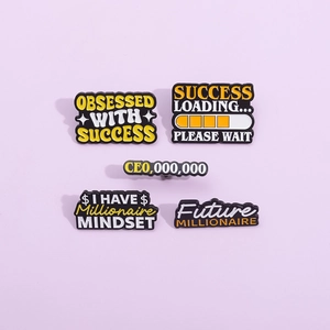 Five motivational enamel pins set with success quotes on a purple background