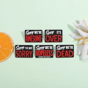 Set of 5 minimalist black enamel pins with creative English quotes and durable metal finish