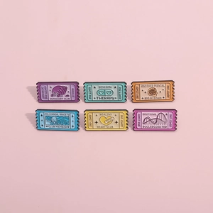 Detail showing set of six colorful retro ticket enamel pins with expressive mental health themes