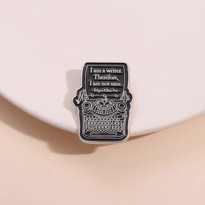Cute retro typewriter enamel brooch with Edgar Allan Poe quote on white paper design