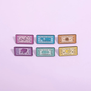 Set of six vintage cinema ticket enamel pins with mental health awareness motifs