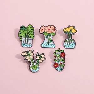 Set of 5 enamel plant pins featuring botanical designs in laboratory glassware vessels