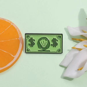 Épingle créative en émail de billet vert avec motif de coquillage et signes dollar us