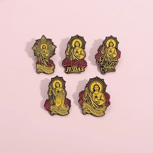 Set of five creative gold-tone religious St. Jude enamel pins with intricate details