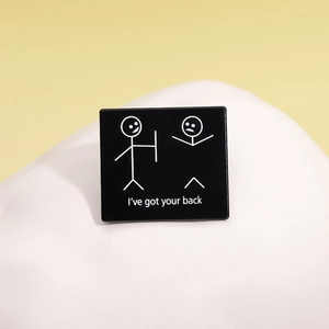 Minimalist black rectangular enamel pin featuring a stick figure 'I've got your back' slogan