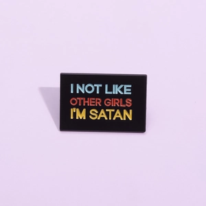 Funny black rectangular enamel pin with colorful Satan text for gothic accessories