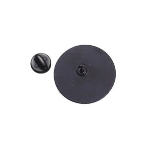 Detail view of the black matte zinc alloy brooch back with rubber pin clutch