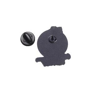 Detailed back view of enamel pin showing black metal plating and secure rubber clutch
