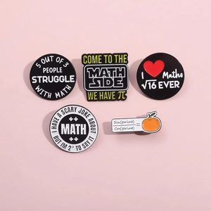 Detailed close-up of 5 math-themed enamel pins with humor quotes on pink background
