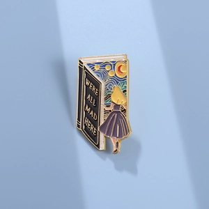 Fantasy Alice in Wonderland book enamel pin featuring Starry Night art and metal plating