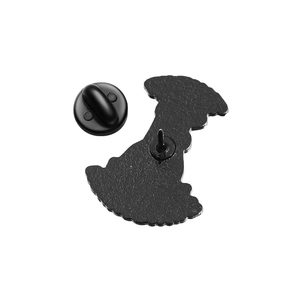 Detail view of black enamel pin back with textured metal finish and rubber clutch