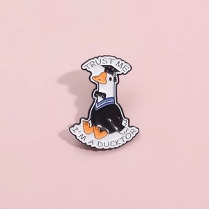 Cute white duck doctor enamel brooch with Trust Me I'm a Ducktor text and graduation cap