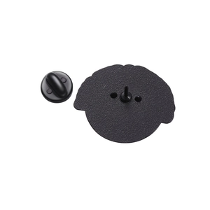 Detail of metal pin back with black rubber clutch and textured sandblast finish