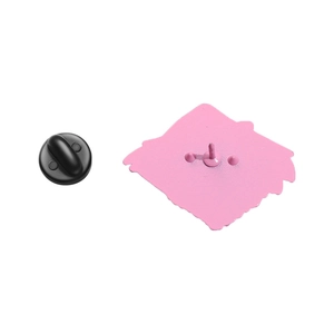 Detail view of the pink enamel pin back with black rubber clutch and secure metal needle