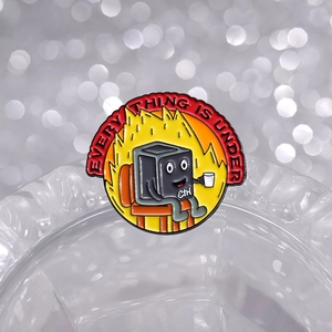 Funny Ctrl key enamel pin with orange flames and Everything Is Under Control text badge