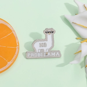 Cute llama enamel pin with sunglasses and No Probllama slogan on mint green background