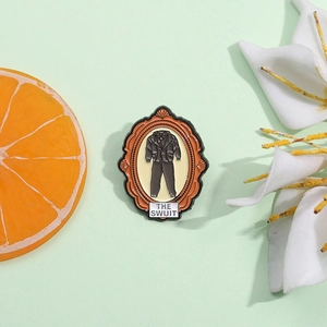 Tarot style enamel brooch with dark grey suit design and The Suit engraving
