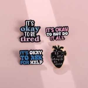 4-piece mental health enamel pins set featuring encouraging quotes and black heart shape