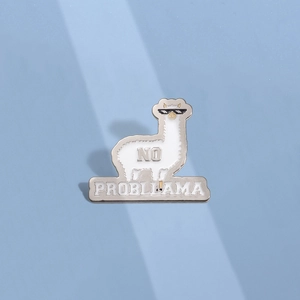 Cool white alpaca enamel pin with sunglasses and No Probllama text on light blue base