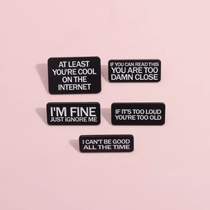Set of 5 black rectangular enamel pins with cool English slogans on pink background