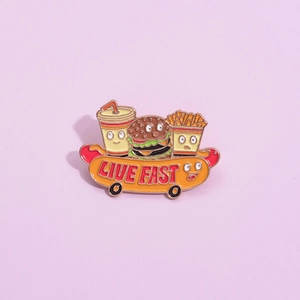 Creative fast food enamel pin with cartoon burger and fries on hot dog skateboard