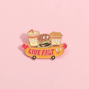Cartoon enamel pin featuring burger fries soda and live fast hot dog skateboard