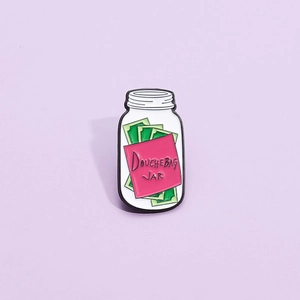 Creative enamel pin featuring a Douchebag Jar design with money inside for movie fans