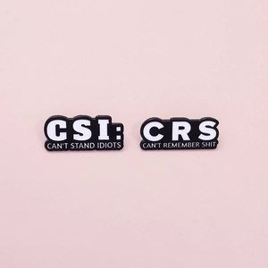 Humorous CSI and CRS enamel pins with funny English text on light pink background