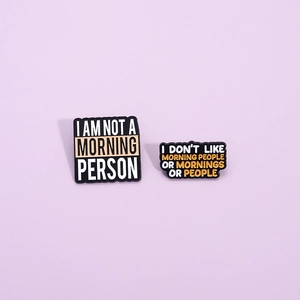 Funny enamel brooch set with sarcastic morning person text on purple background
