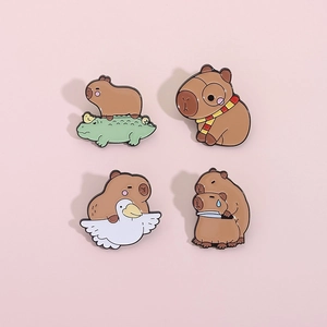Set of four cute cartoon capybara enamel pins featuring funny animal scenes
