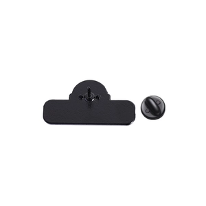 Detailed macro view of black metal pin base and ergonomic rubber butterfly clutch back