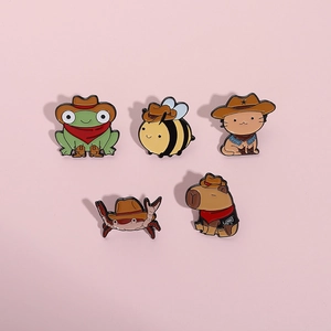 Cartoon cowboy animal enamel pin set featuring frog bee cat crab and capybara badges