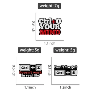 Detailed view of computer shortcut enamel pins with dimensions and weight specs