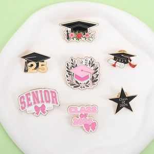 Class of 2025 graduation enamel pins set featuring pink and black mortarboard designs