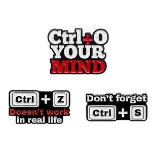 Three creative computer shortcut enamel pins featuring Ctrl O, Ctrl Z, and Ctrl S designs