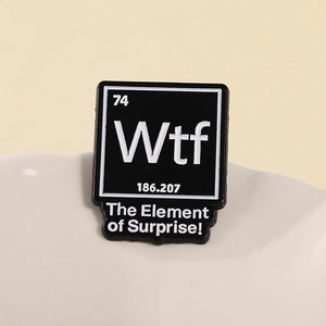 WTF chemical element periodic table enamel pin with The Element of Surprise slogan