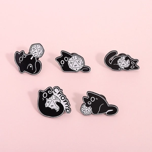 5-piece set of black cat enamel pins with D20 dice on a vibrant pink background