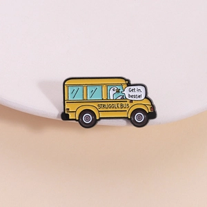 Funny yellow Struggle Bus enamel pin with a white goose driving and cute caption