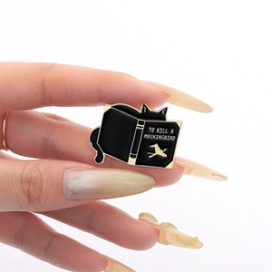 Cartoon black cat book brooch pin with To Kill a Mockingbird literary design