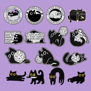 Set of 14 cute black cat enamel pins with humorous quotes on a light purple background