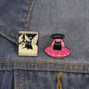 Cartoon tarot cat and UFO enamel pins set on denim fabric for jackets and bags