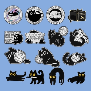 Set of 14 black cat enamel pins with funny slogans and cartoon designs on blue background