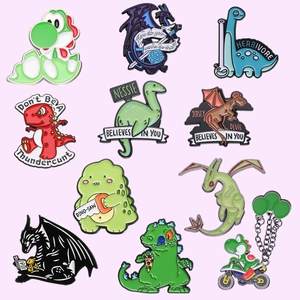 Set of 10 colorful enamel dinosaur pins featuring various cute cartoon designs
